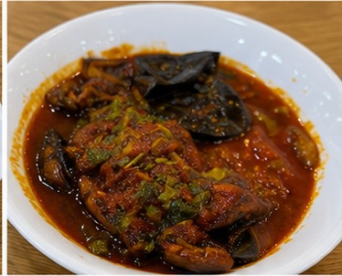 Aubergine stew with tomatoes